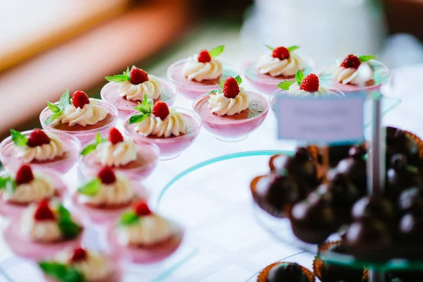 Sweets on holiday party table — Stock Photo, Image