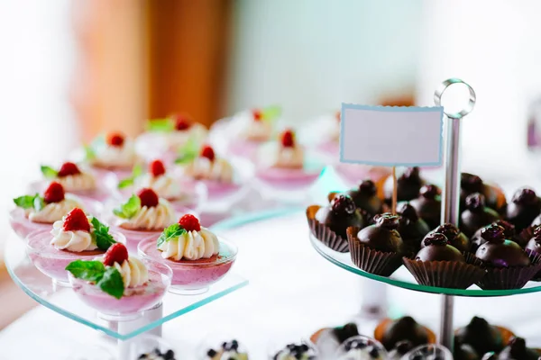 Sweets on holiday party table — Stock Photo, Image