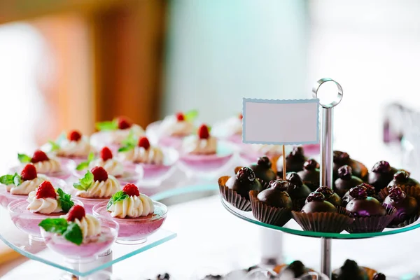 Sweets on holiday party table — Stock Photo, Image