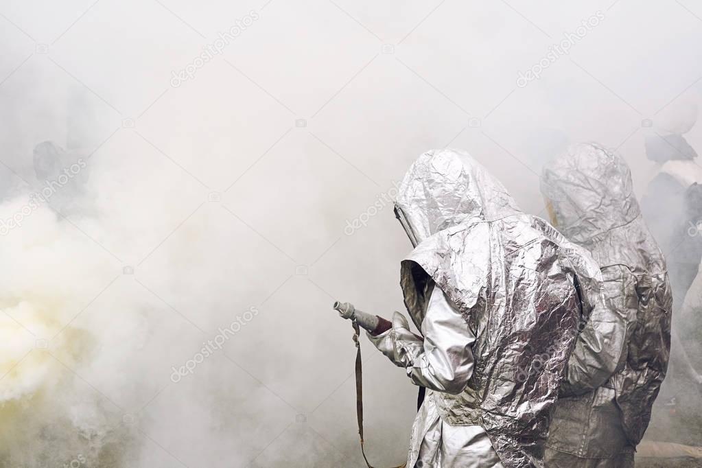firefighters in thermal suits