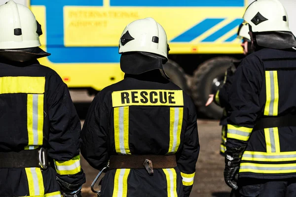 Firefighters fighting fire during training — Stock Photo, Image