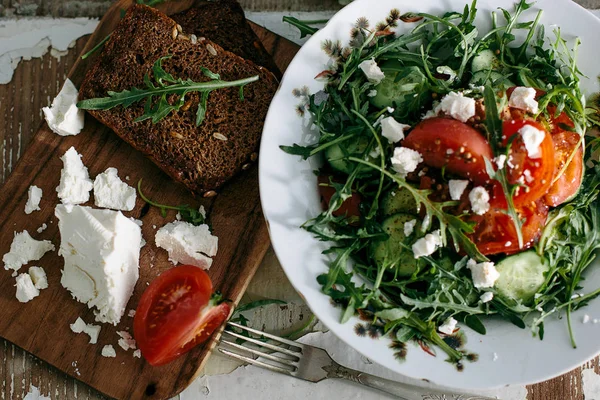 Plate of green salad with vegetables — Stock Photo, Image