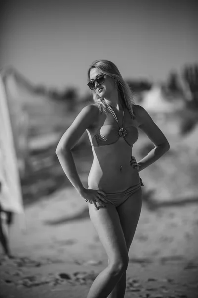 young sexy tanned woman in bikini