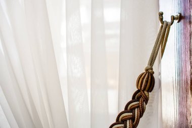 Oda perdeleri için tutucu