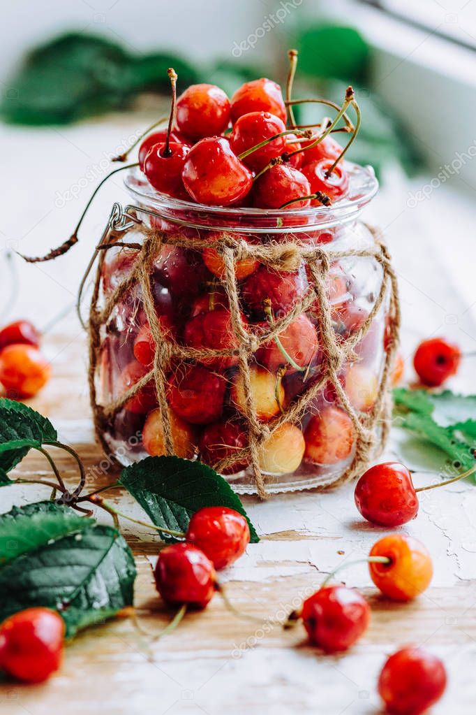 Cherries on wooden table 