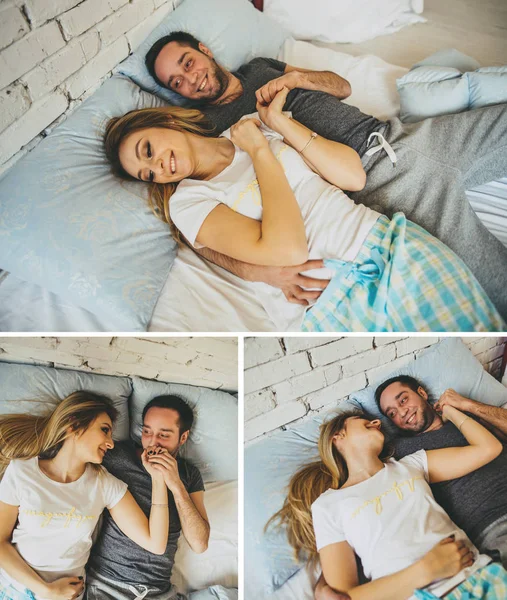 Jovem família relaxante na cama juntos . — Fotografia de Stock