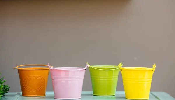 Colored  gardening metal buckets