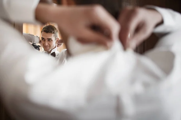 Dressing groom and preparing for ceremony — Stock Photo, Image