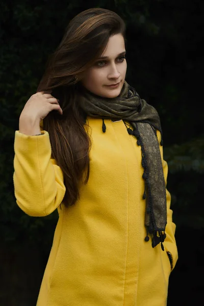 beautiful woman in park in autumn