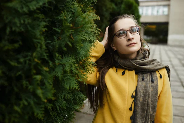 beautiful woman in park in autumn