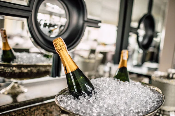 Champagne bottles in a metal bucket