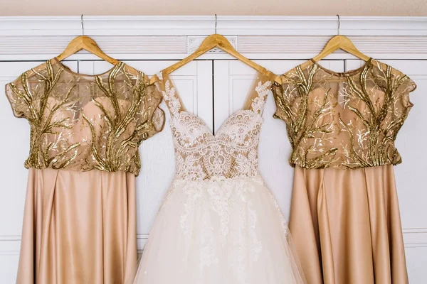 white dress for bride and bridesmaids dresses together.