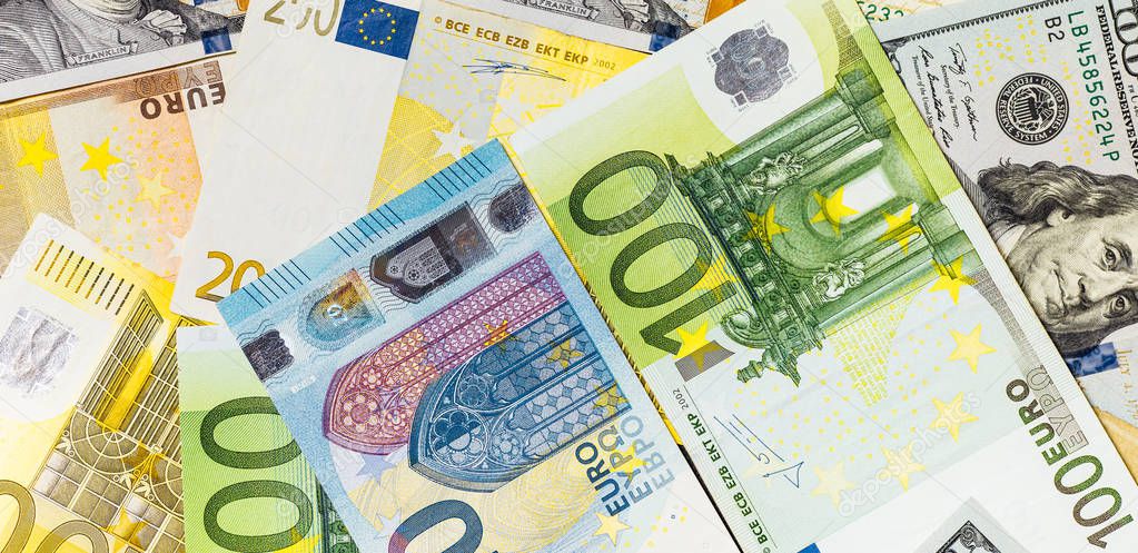 Euro and USA dollar money banknotes background, wealth concept