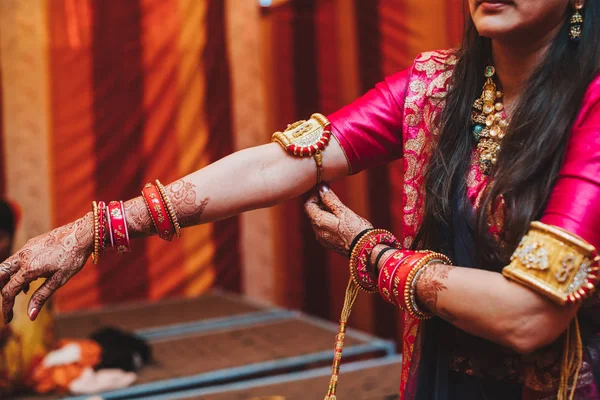 Closeup of Indian bride\'s hands covered with mehndi