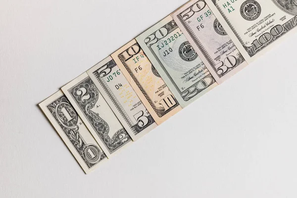 Доллар Банкноты Долларах Сша Белой Доске Разряженном Фоне — стоковое фото