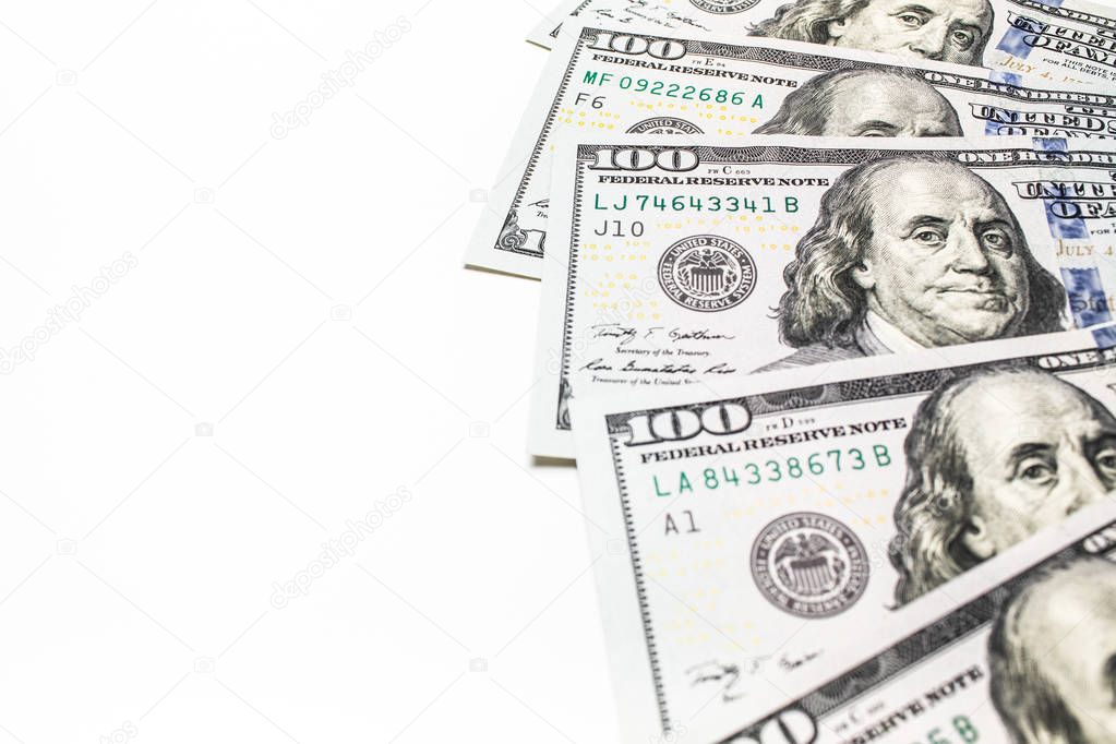 One hundred dollar bills isolated on white background