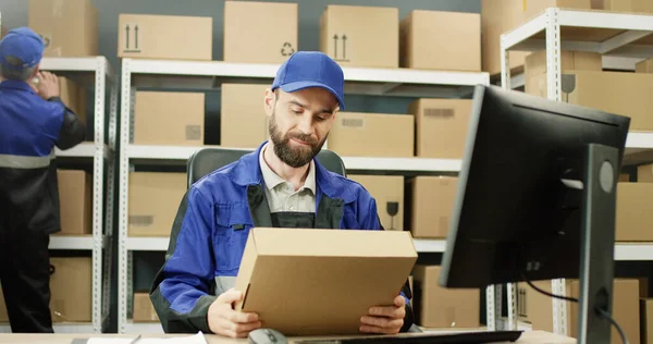 Portrait Delivery Man Uniform Working Computer Post Office Store Parcels — Stock Photo, Image