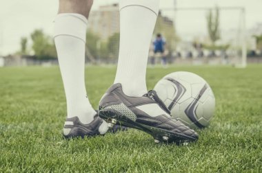 Futbol oyuncusu bir Top hits. Yakın çekim