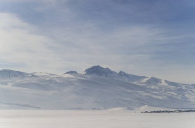scenic shot of snow-capped mountains in winter