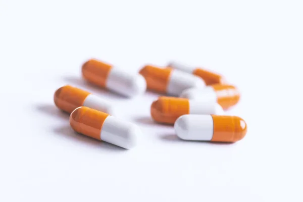 治疗药物处方 药用药物 药学主题 橙色白色药物的大堆 — 图库照片