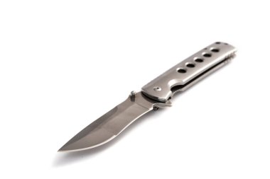 Çakı beyaz arka planda izole edilmiş. Modern katlama bıçağı..