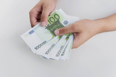 Man counting money, economy concept, allocation of money.Euro