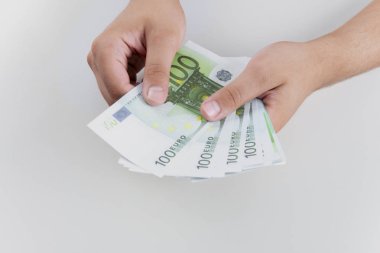 Man counting money, economy concept, allocation of money.Euro