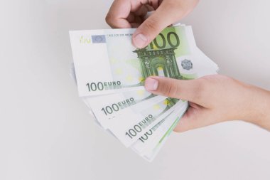 Man counting money, economy concept, allocation of money.Euro