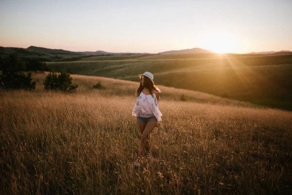 young woman in field