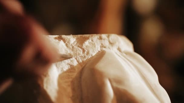 Sculptor works with marble statuette — Stock Video