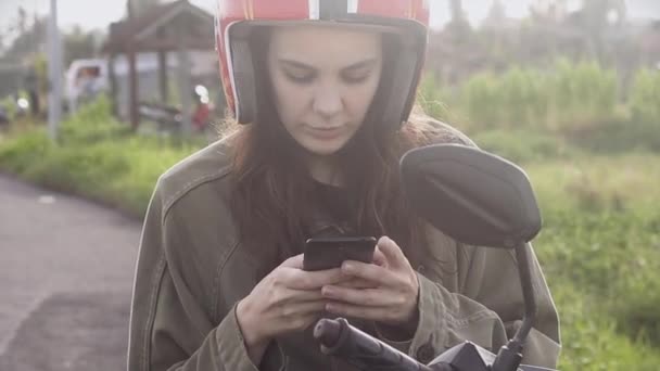 Girl Traveler Text Message Phone Stopping Bike Edge Road Sunrise — Stock Video