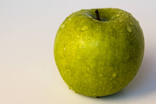 Green Apple on a white isolated background