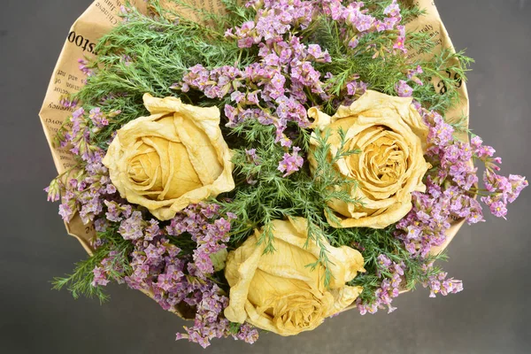 Bouquet of dried roses and dried flowers