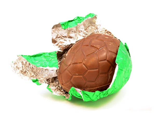 Isolated White Image Hollow Chocolate Egg Being Unwrapped Its Green — Stock Photo, Image