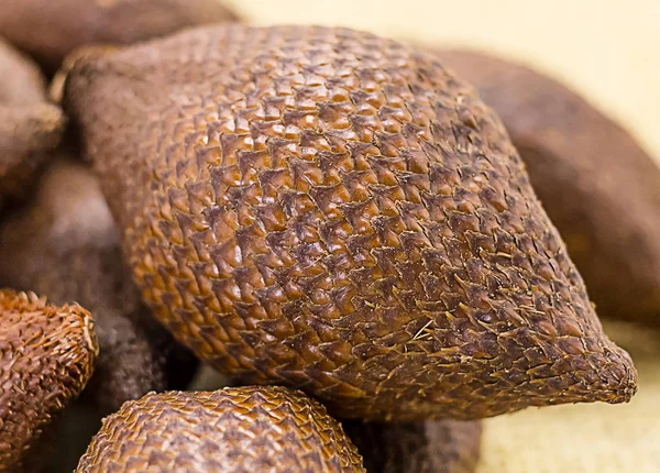 salak snake fruit close-up, thin brown peel snake pattern, juicy fruit