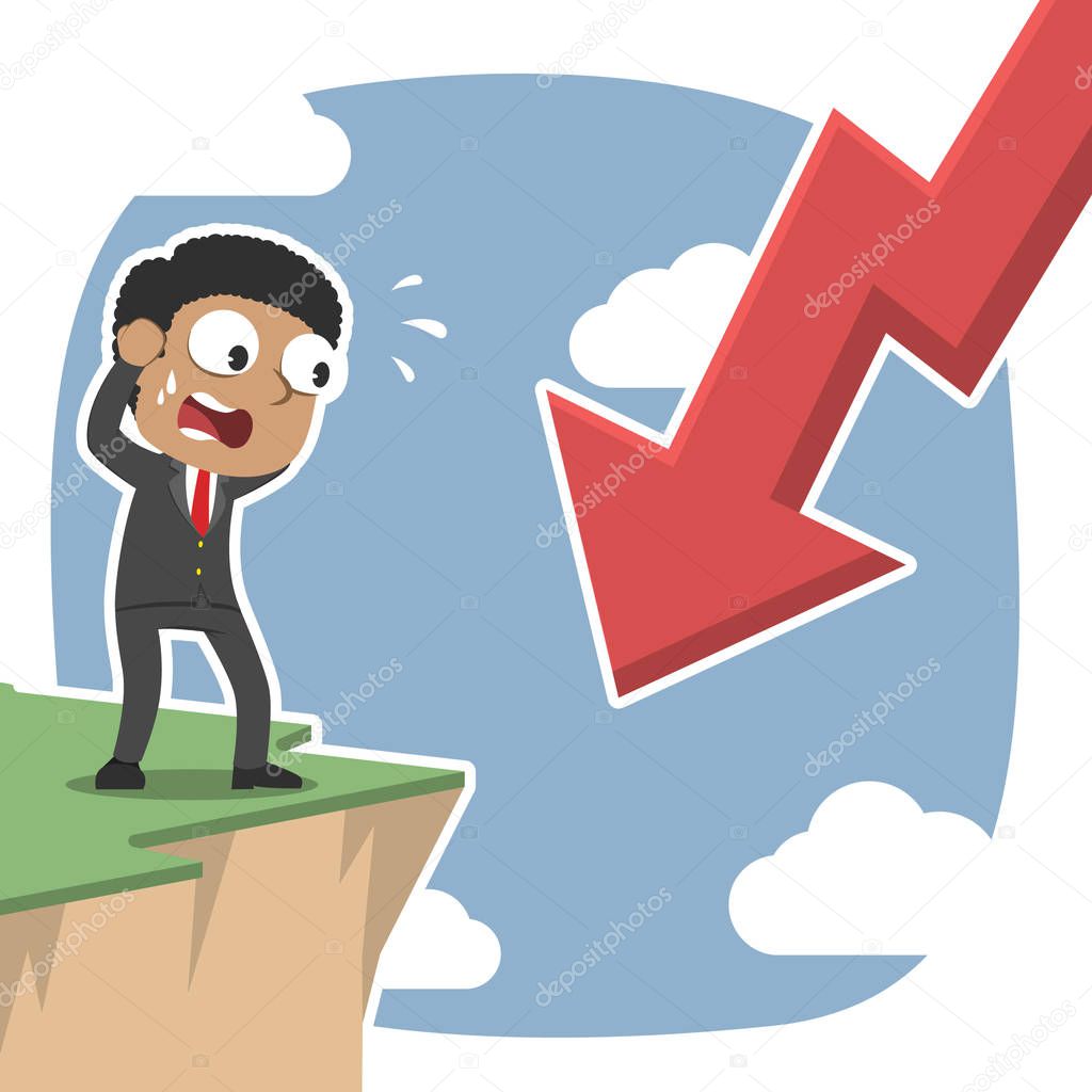 african businessman shock see downward arrow from cliff edge