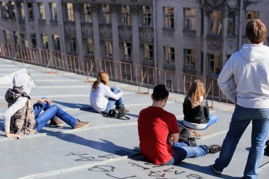 Teens on the roof of the city clipart