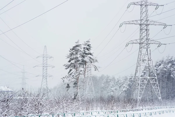 Line of electrical gear in the snow