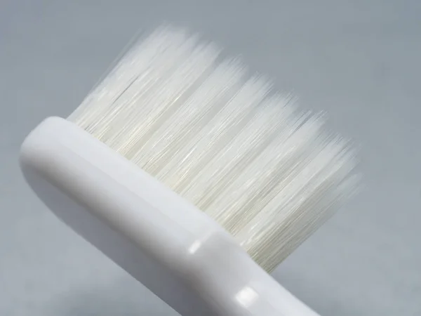 Witte tandenborstel macro — Stockfoto