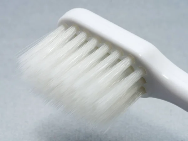 White toothbrush macro — Stock Photo, Image