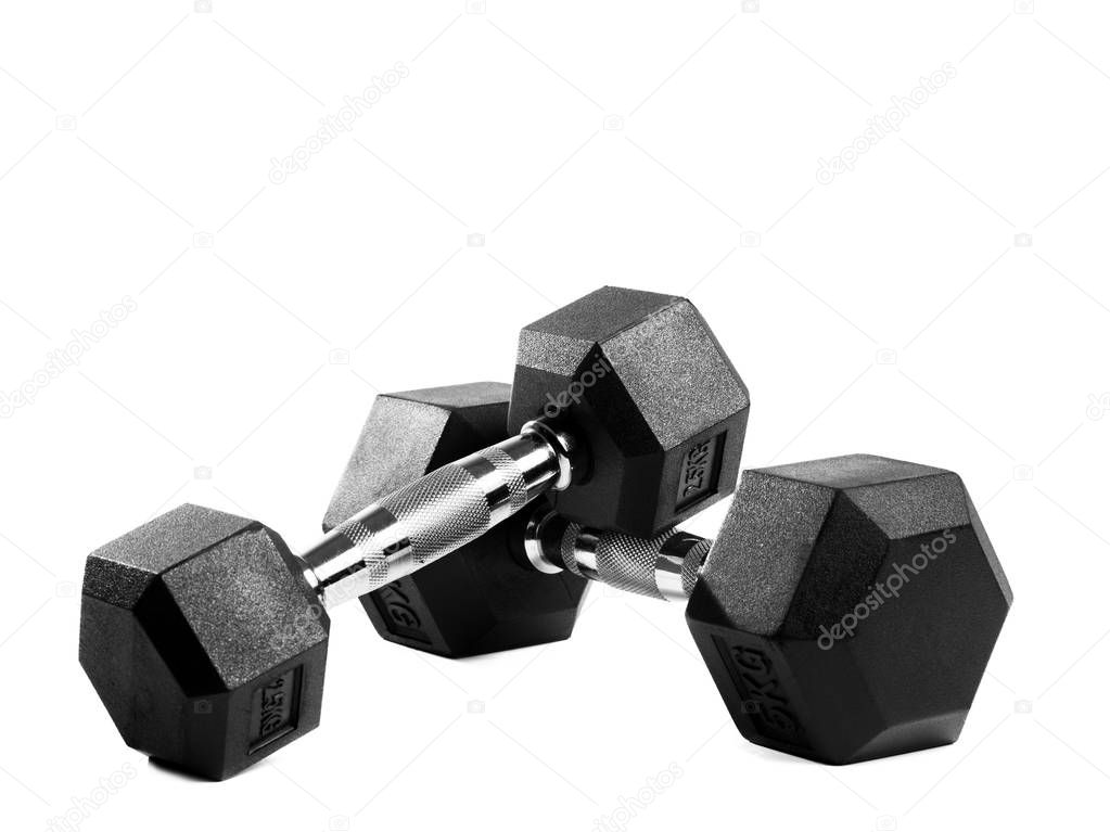 Metal dumbbells on isolated background