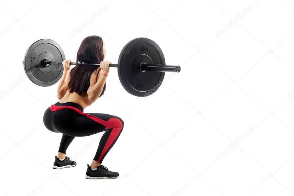 woman  seated pad with a barbell 