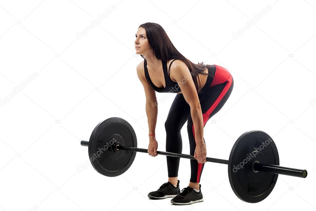 Woman doing exercise of deadlift 