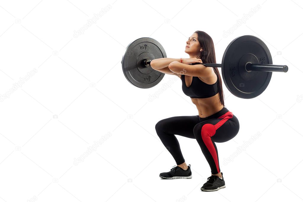 Woman doing squat with a barbell