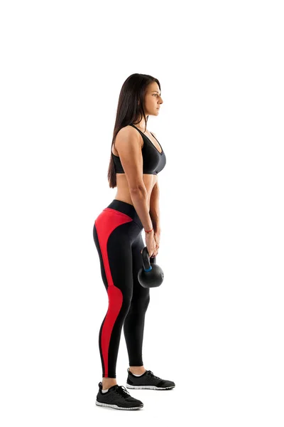 Mujer haciendo un ejercicio con peso — Foto de Stock