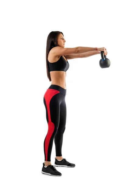 Kvinnan gör en övning med vikt — Stockfoto