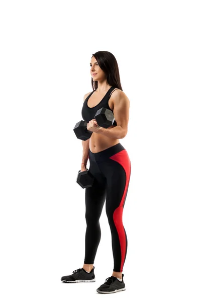 Žena, která dělá cvičení s činkami na biceps — Stock fotografie