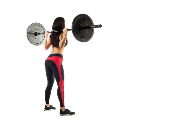 Mujer hace una sentadilla — Foto de Stock