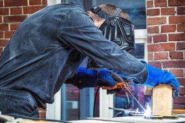 adam bir metal kaynak makinası bira 