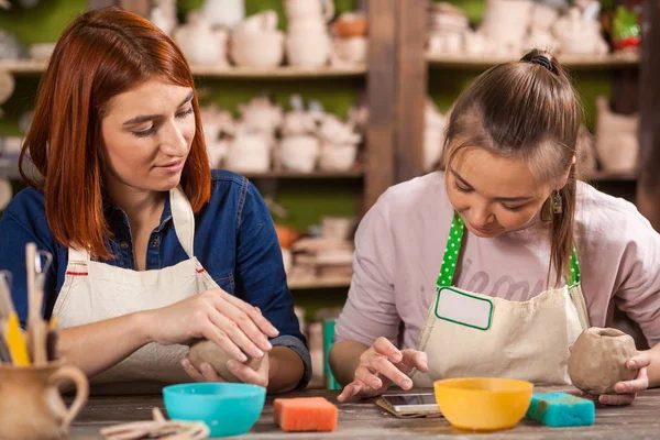 woman potter working